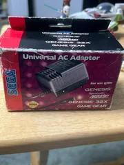 Carátula de Sega Universal AC Adaptor