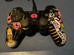 Carátula de Homer Simpson Controller